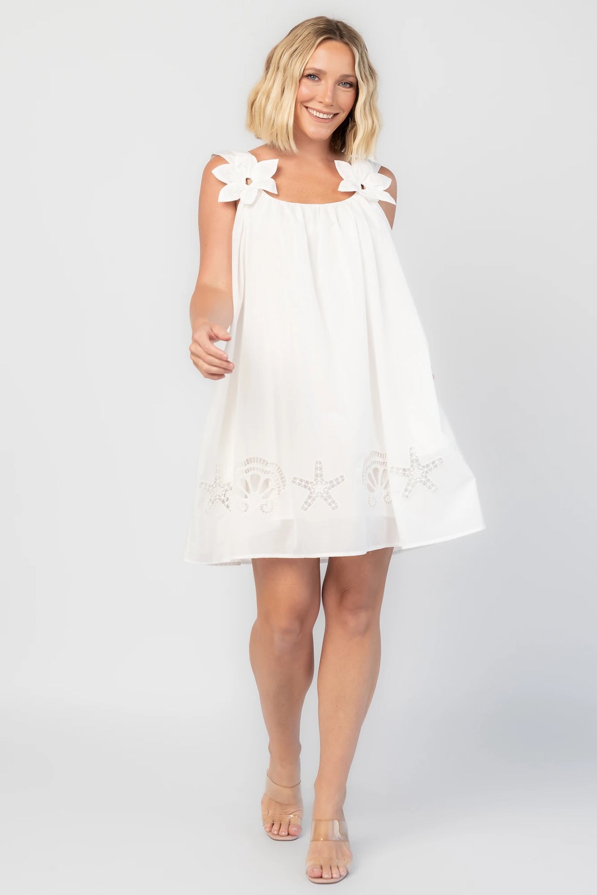 Citrus Short Dress in Off White with scoop neckline, shell and starfish cutouts, and relaxed silhouette.