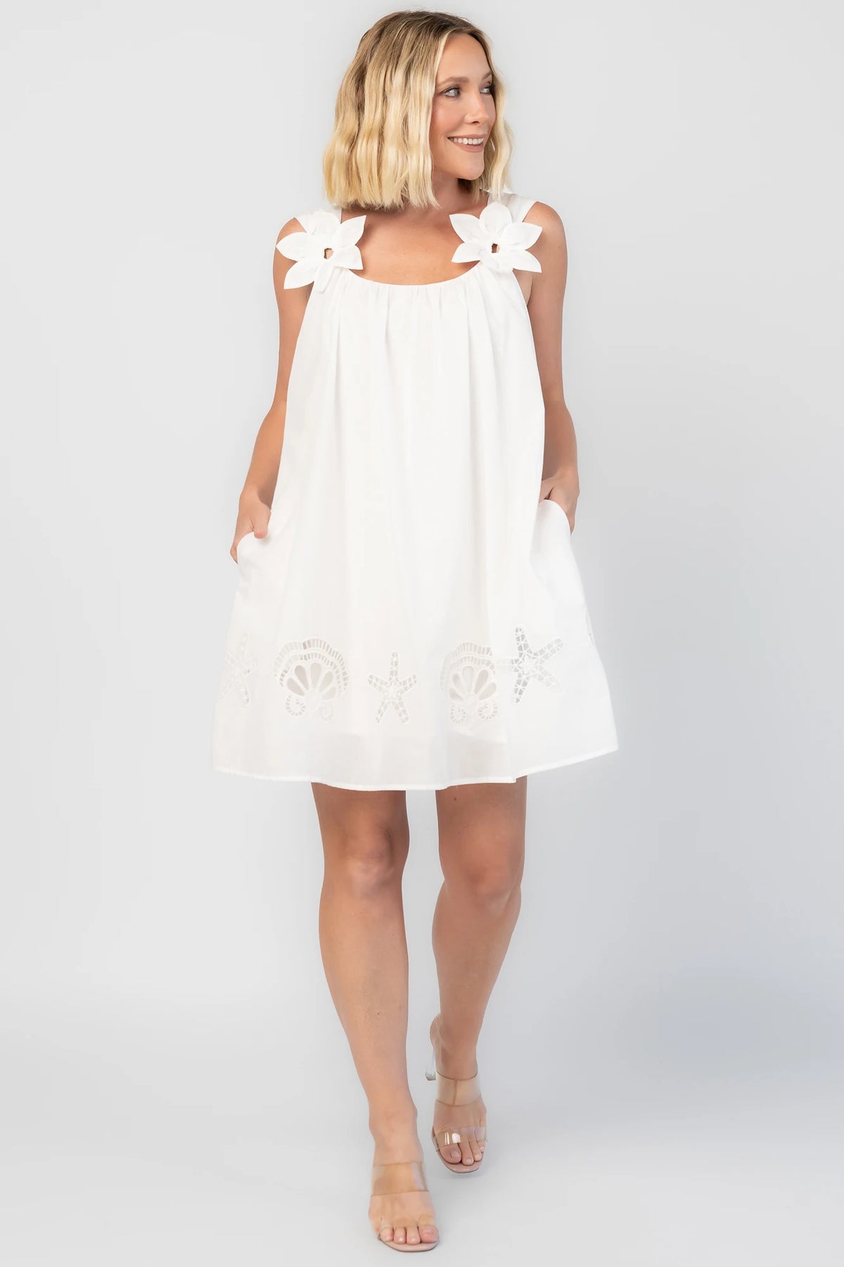 Citrus Short Dress in Off White with scoop neckline, shell and starfish cutouts, and relaxed silhouette.