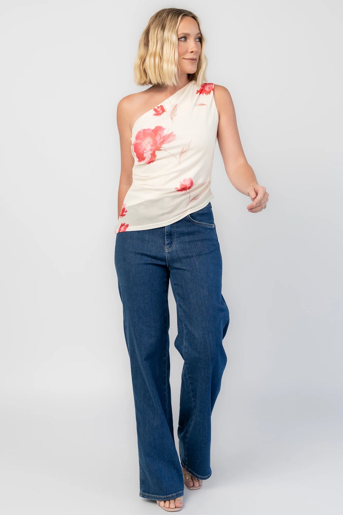 Cleo Mesh Top in Cream Floral with one-shoulder neckline, ruched bodice, and fitted silhouette.