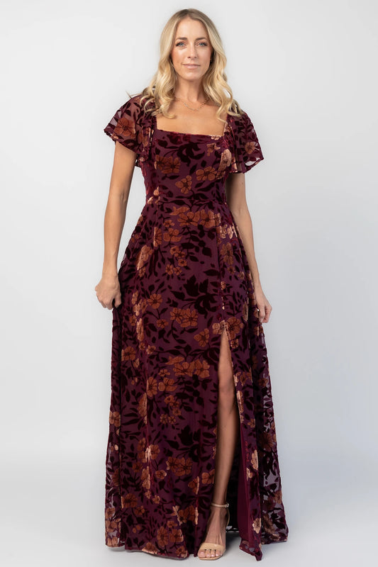Clio Maxi Dress in Mulberry + Gold Floral with square neckline, flutter sleeves, and empire waist.