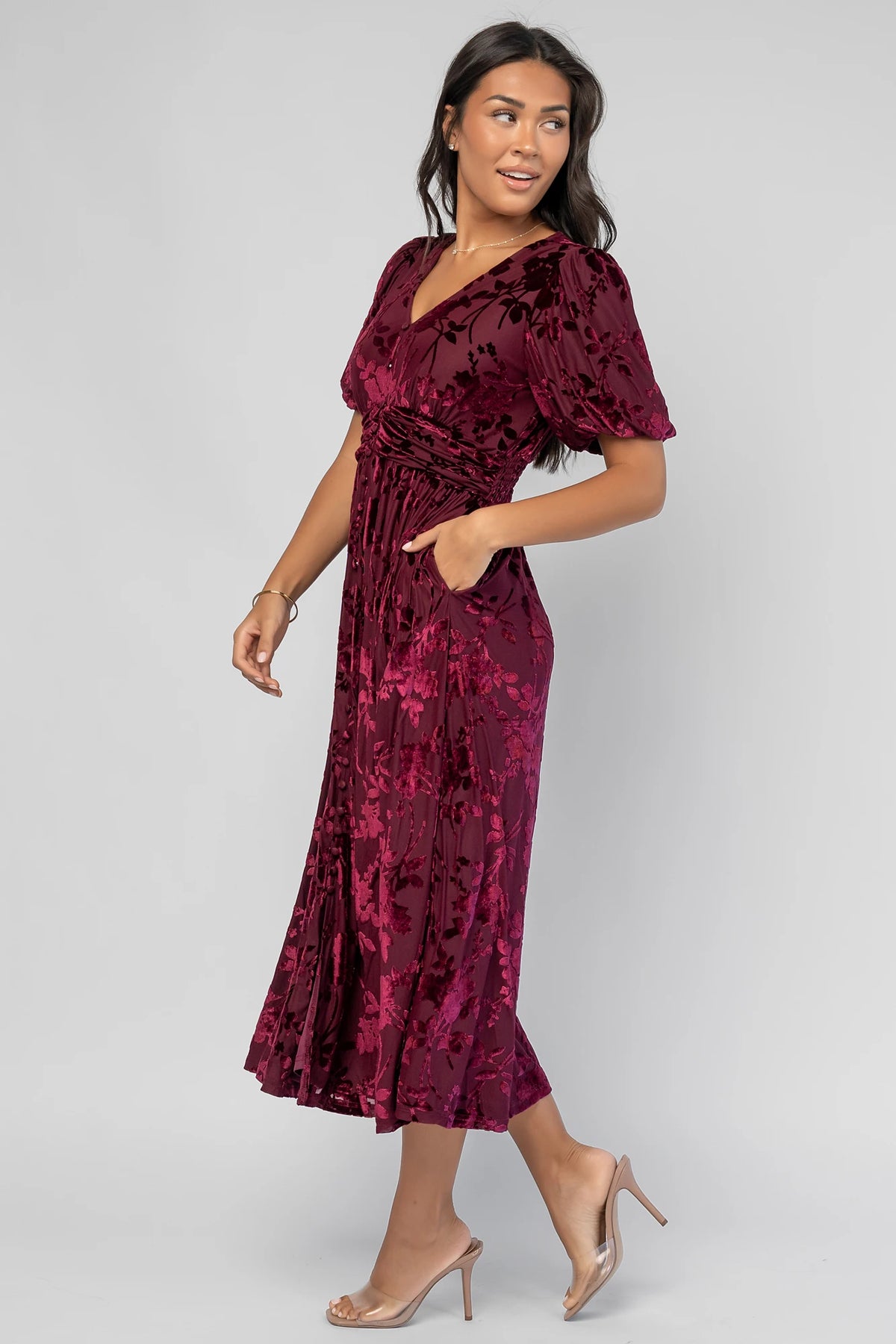 Dahlia Velvet Dress in Mulberry Floral with embossed velvet texture, a V-neckline, faux-button placket, and puff sleeves.