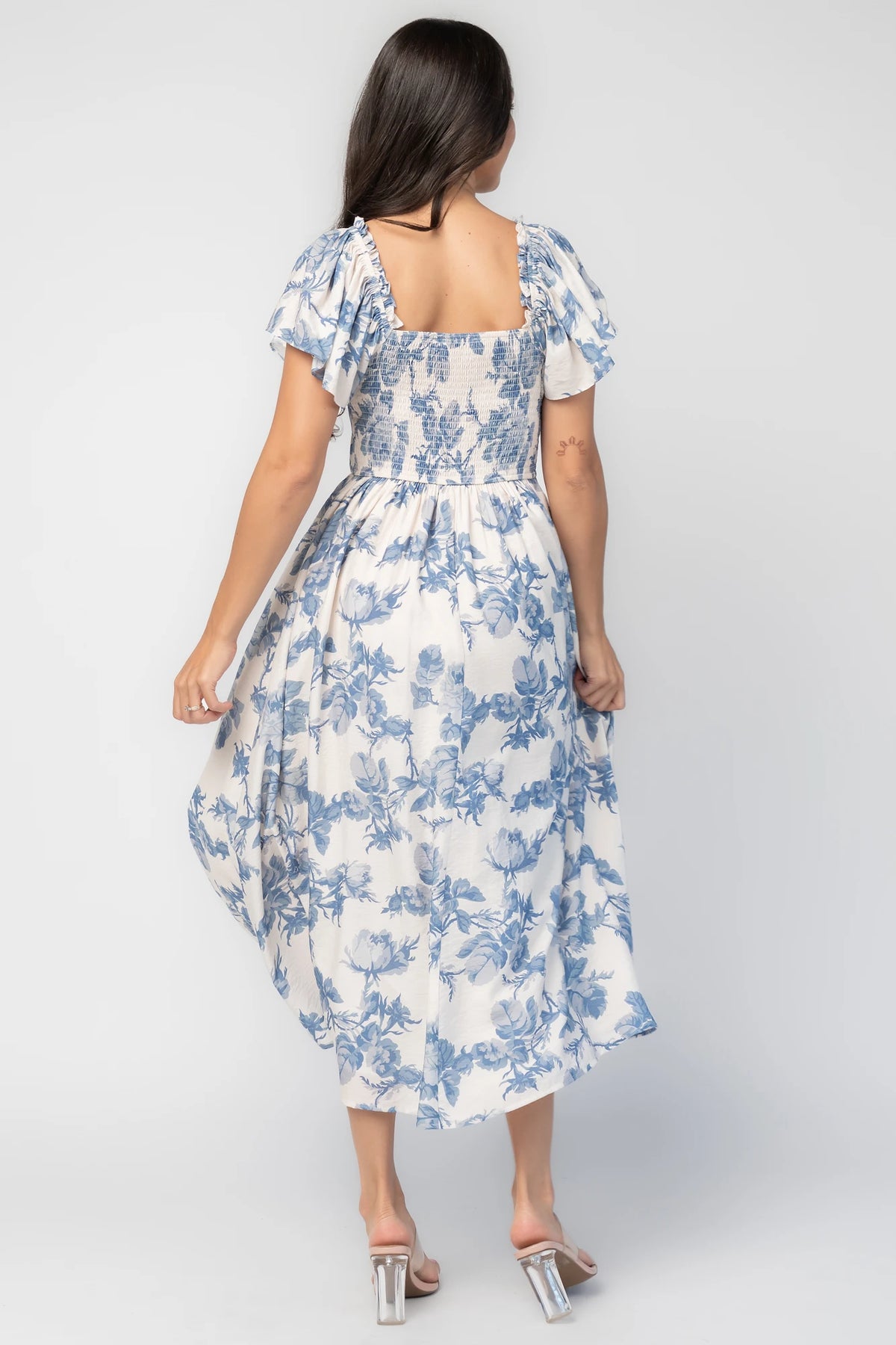 Darlene Dress in Ivory and Blue Floral with square neckline, flutter sleeves, and fit-and-flare midi skirt.