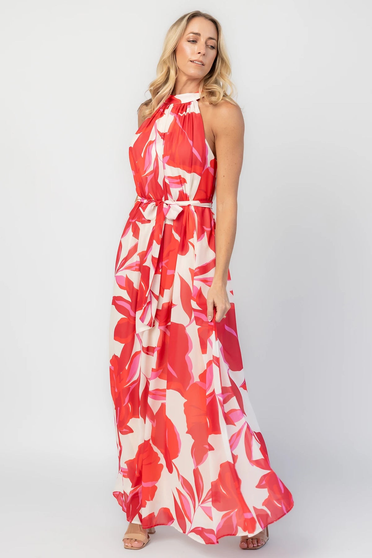 Derya Halter Maxi Dress in Multi Print with halter neckline, V-back, and flowing maxi skirt.