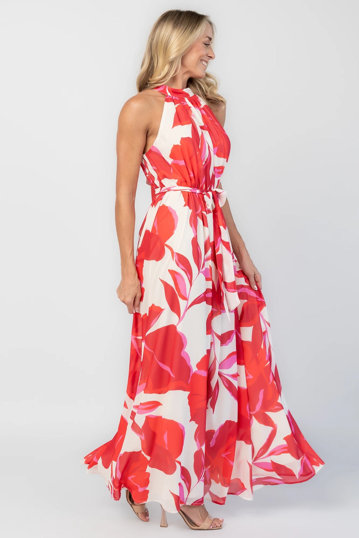 Derya Halter Maxi Dress in Multi Print with halter neckline, V-back, and flowing maxi skirt.