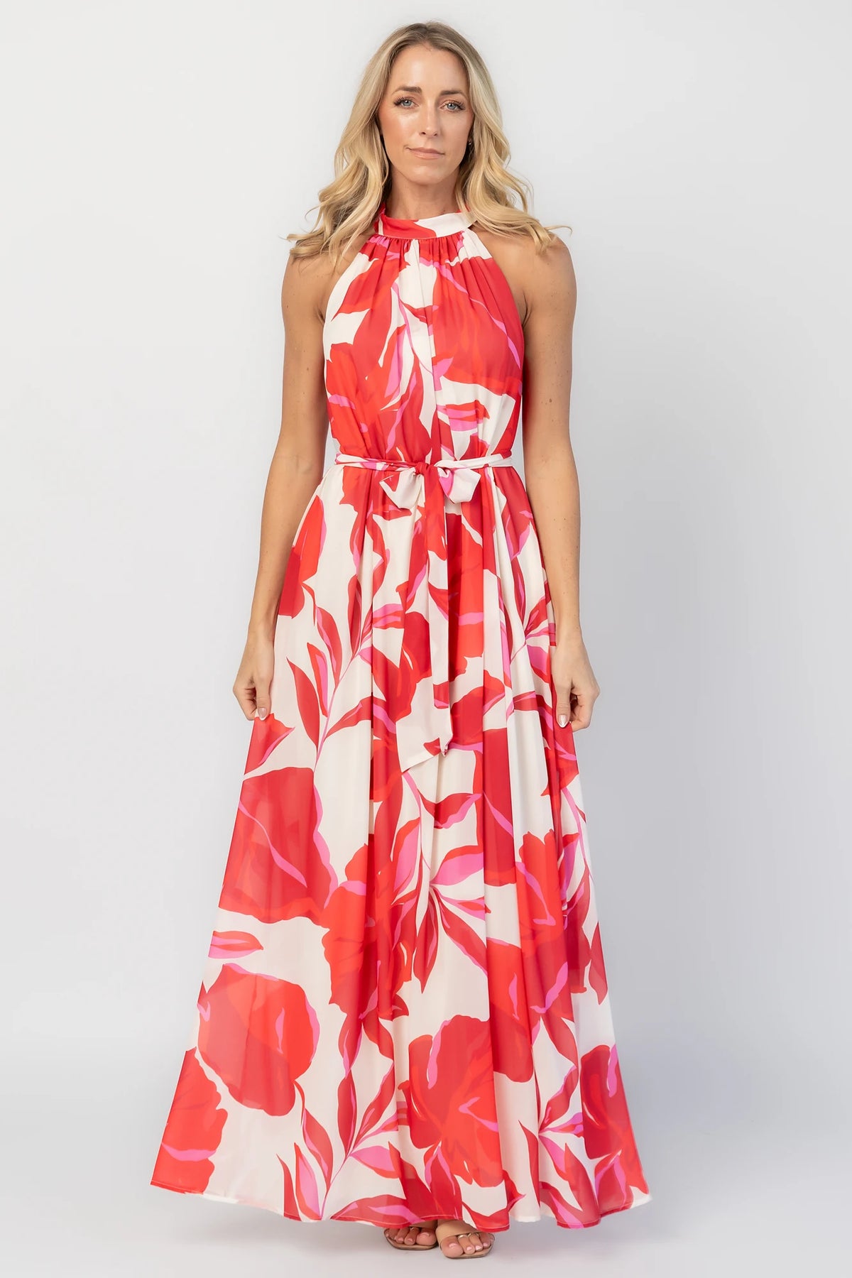Derya Halter Maxi Dress in Multi Print with halter neckline, V-back, and flowing maxi skirt.