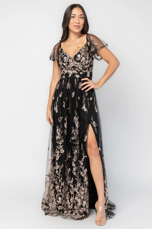 Esmerelda Shimmer Gown in Black + Rose with floral sequin embroidery, surplice V-neckline, flutter sleeves, and front slit.