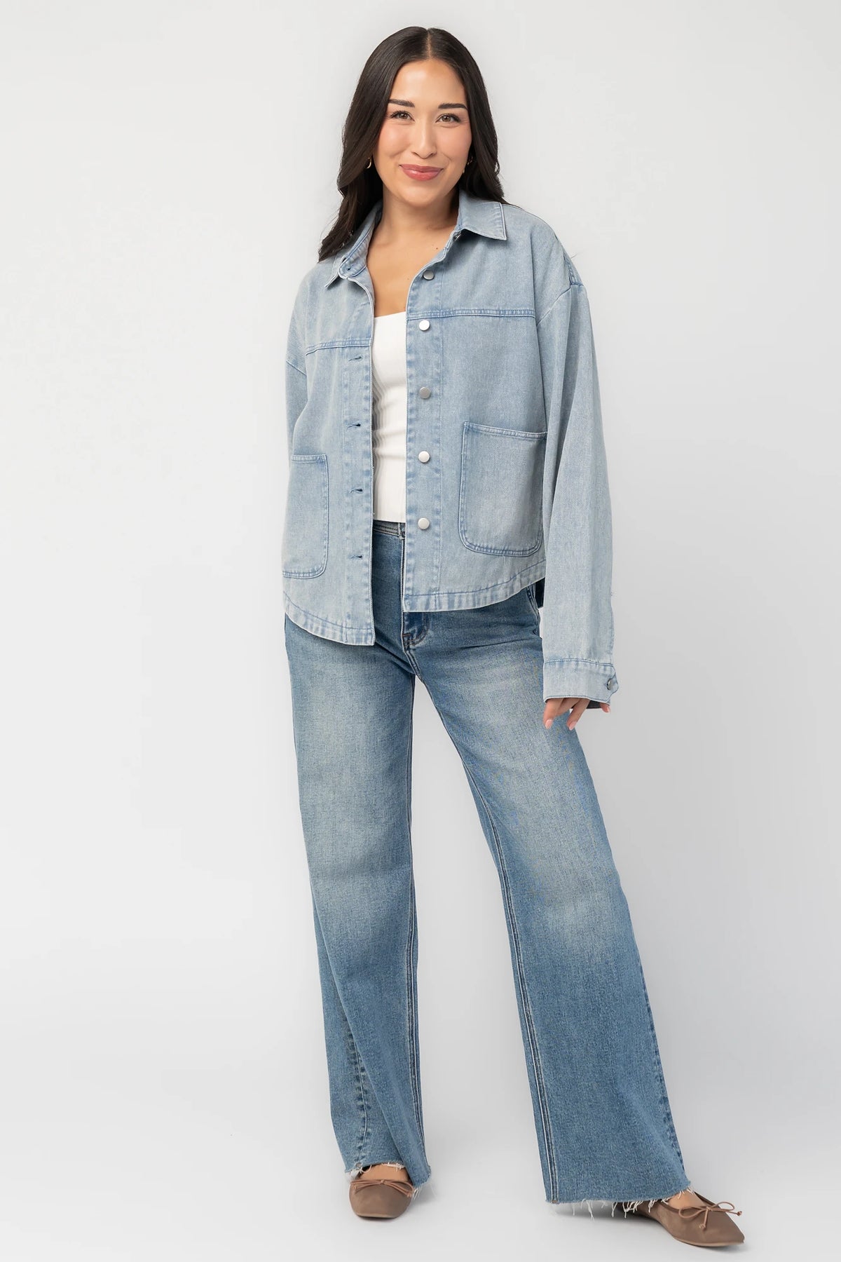 Finn Lightweight Jacket in Vintage Blue with button front, classic collar, front pockets, and shirttail hem.