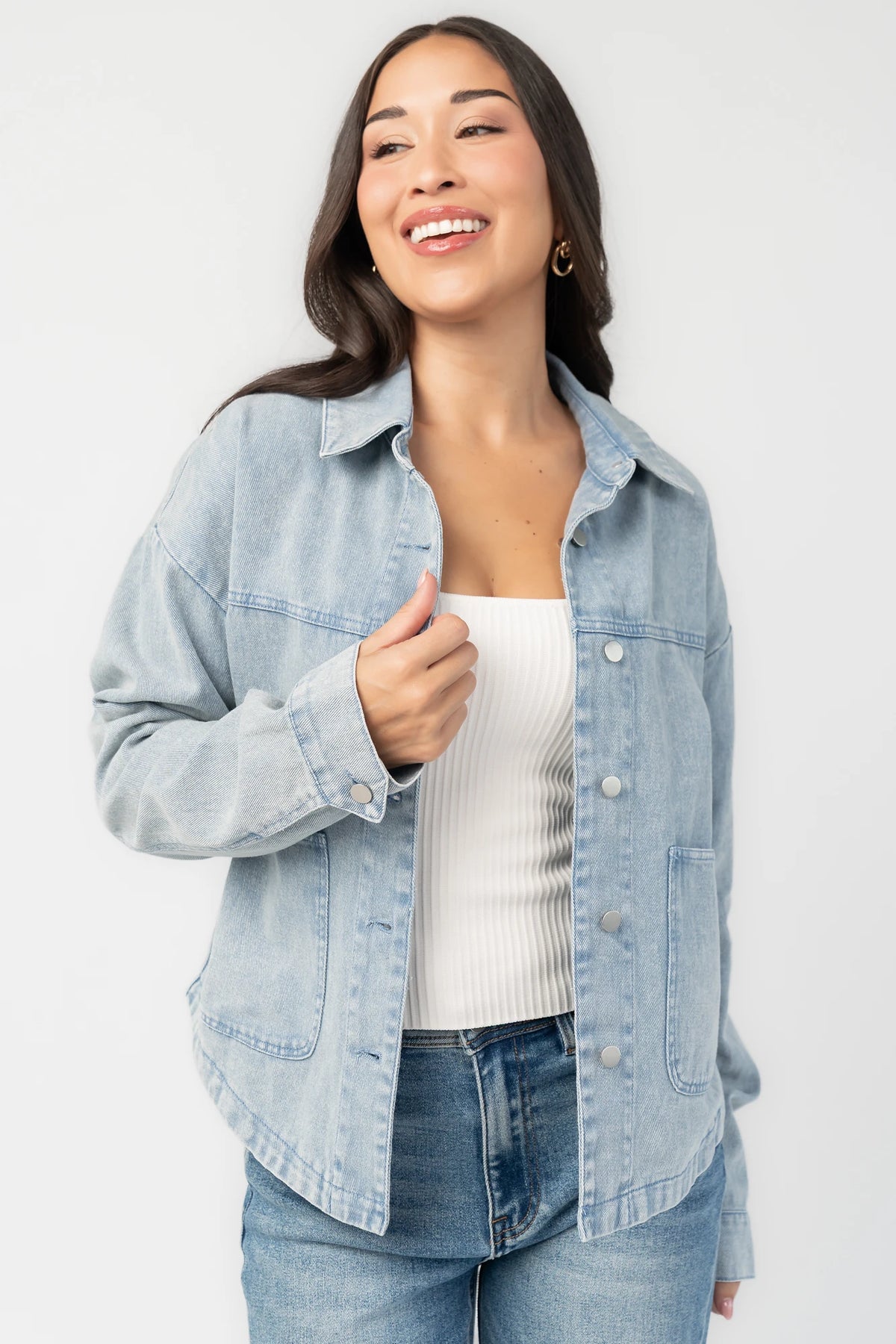 Finn Lightweight Jacket in Vintage Blue with button front, classic collar, front pockets, and shirttail hem.