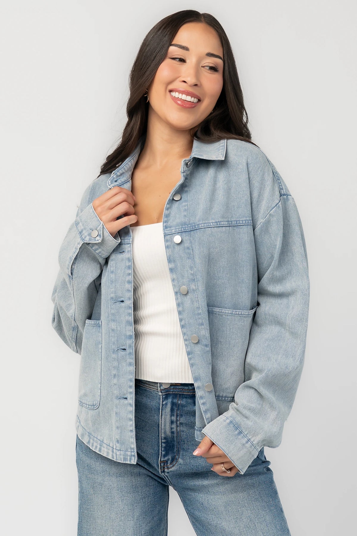 Finn Lightweight Jacket in Vintage Blue with button front, classic collar, front pockets, and shirttail hem.