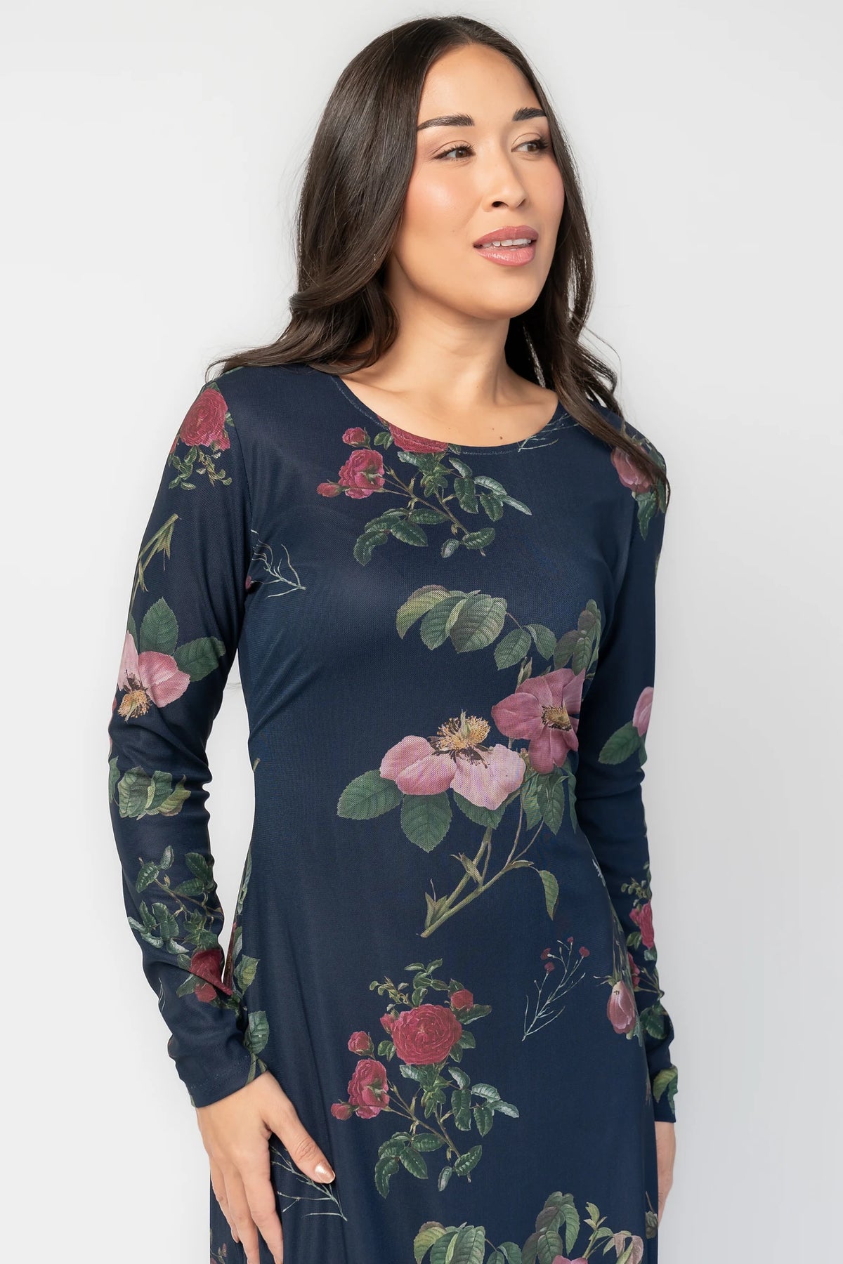 Fiorella Mesh Midi Dress in Navy Floral with soft mesh fabric, sheer long sleeves, removable waist tie, and midi skirt.