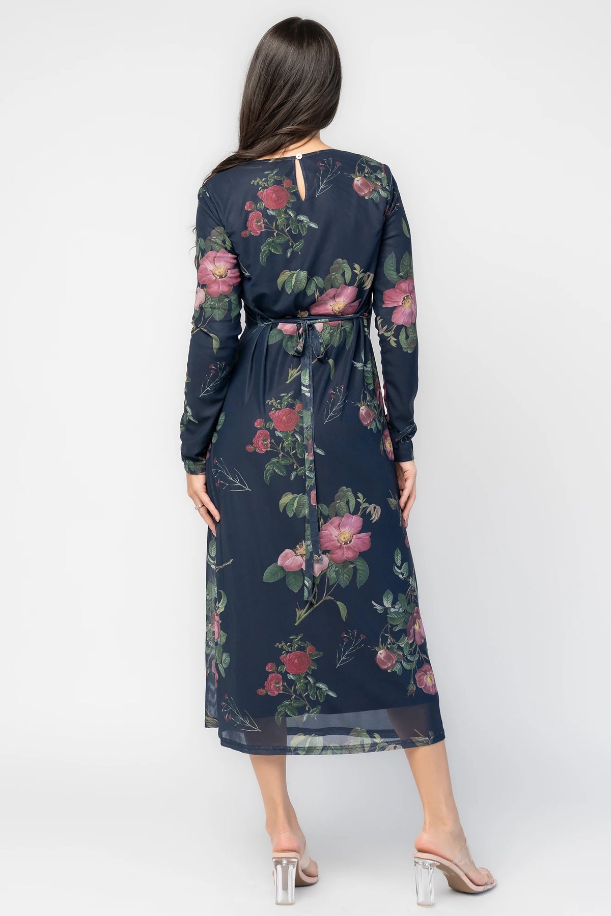 Fiorella Mesh Midi Dress in Navy Floral with soft mesh fabric, sheer long sleeves, removable waist tie, and midi skirt.