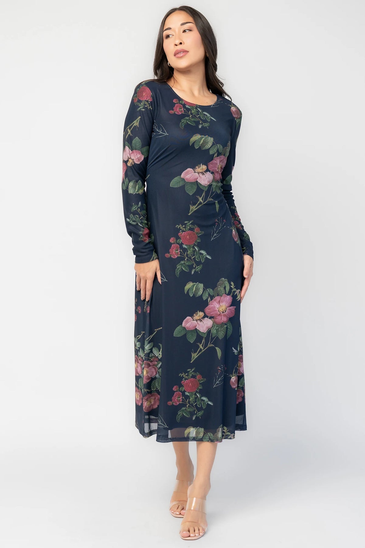 Fiorella Mesh Midi Dress in Navy Floral with soft mesh fabric, sheer long sleeves, removable waist tie, and midi skirt.