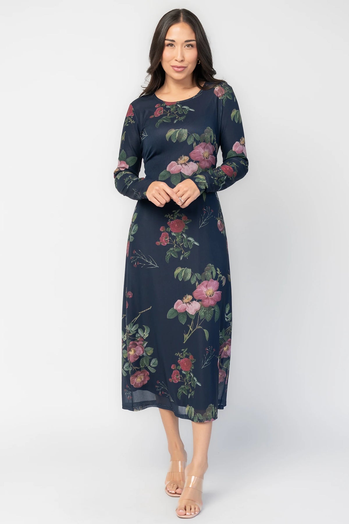 Fiorella Mesh Midi Dress in Navy Floral with soft mesh fabric, sheer long sleeves, removable waist tie, and midi skirt.
