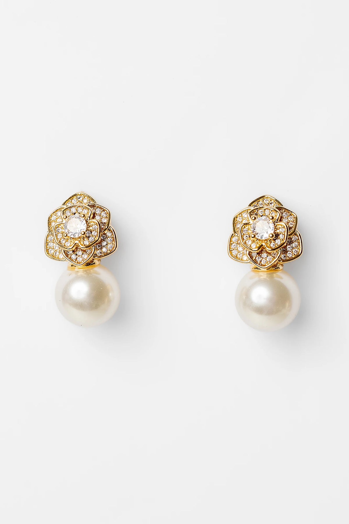 Helena Floral Pearl Drop Earrings in Gold with floral cubic zirconia studs and faux pearl drop.