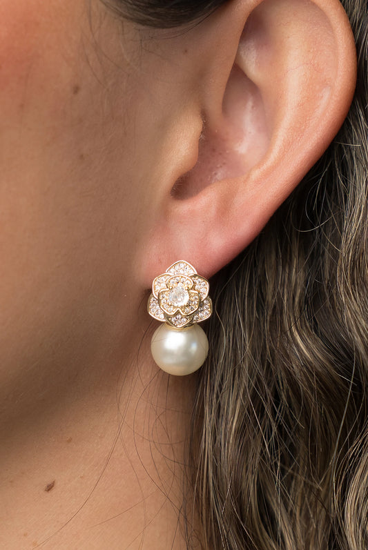 Helena Floral Pearl Drop Earrings in Gold with floral cubic zirconia studs and faux pearl drop.