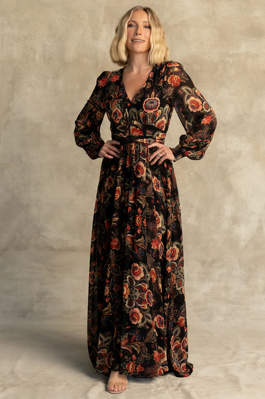 Hera Maxi Dress in Black Multi Print with deep V-neckline, long sleeves, gathered waist, and smocked back.