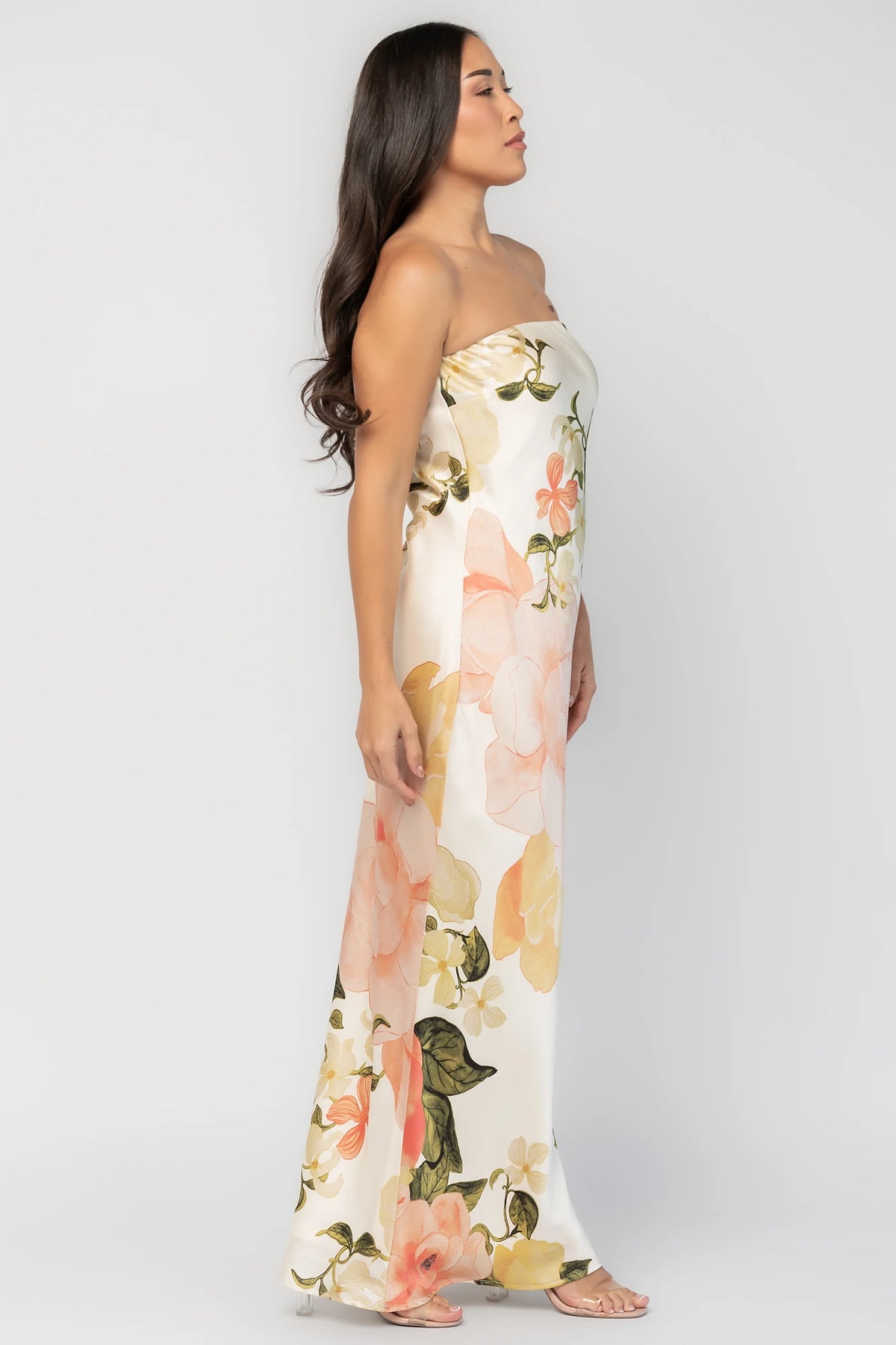 Hermosa Strapless Maxi Dress in Off White Multi Floral with strapless fitted bodice, fitted waist, and flowing maxi skirt.