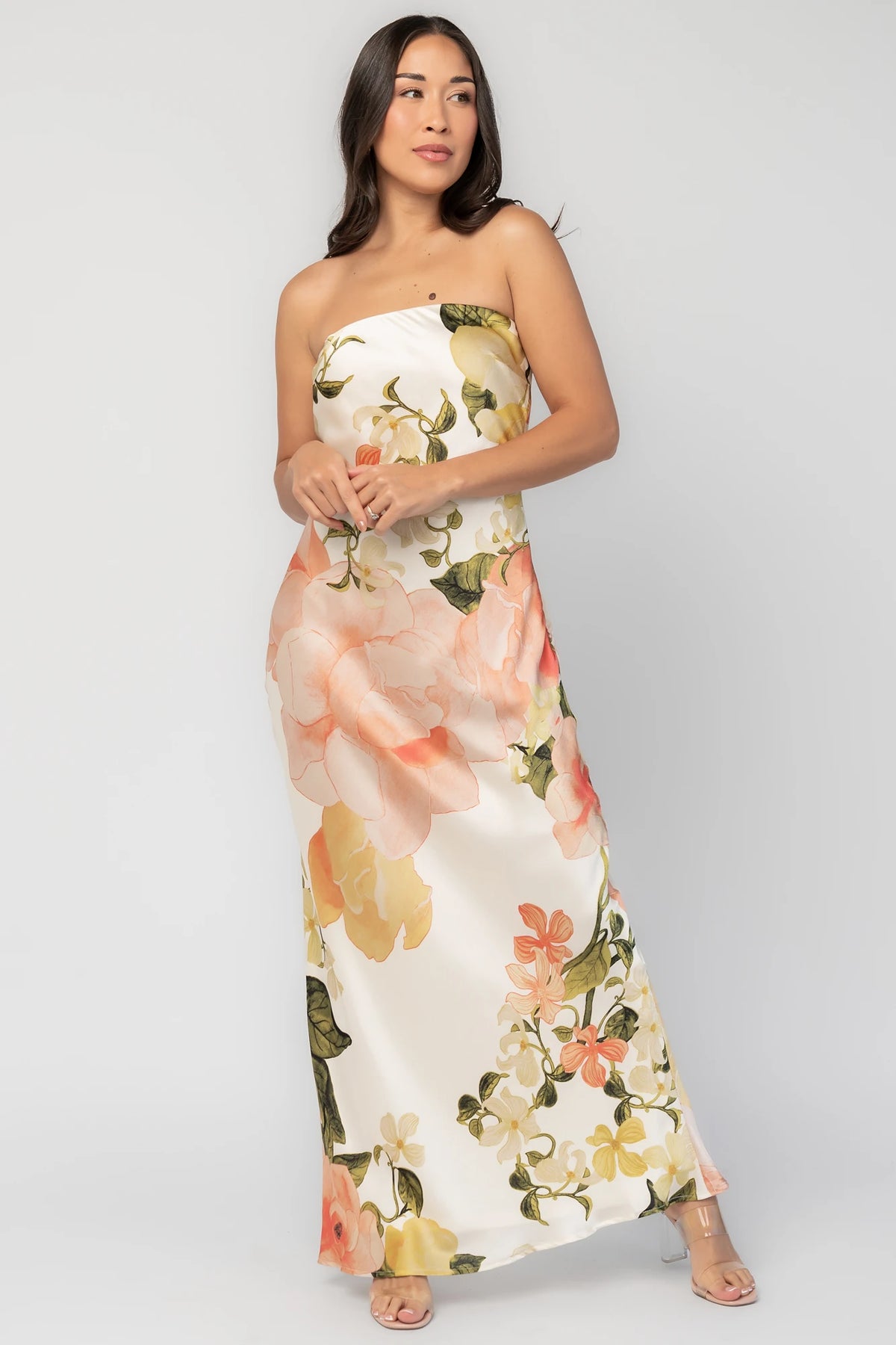 Hermosa Strapless Maxi Dress in Off White Multi Floral with strapless fitted bodice, fitted waist, and flowing maxi skirt.