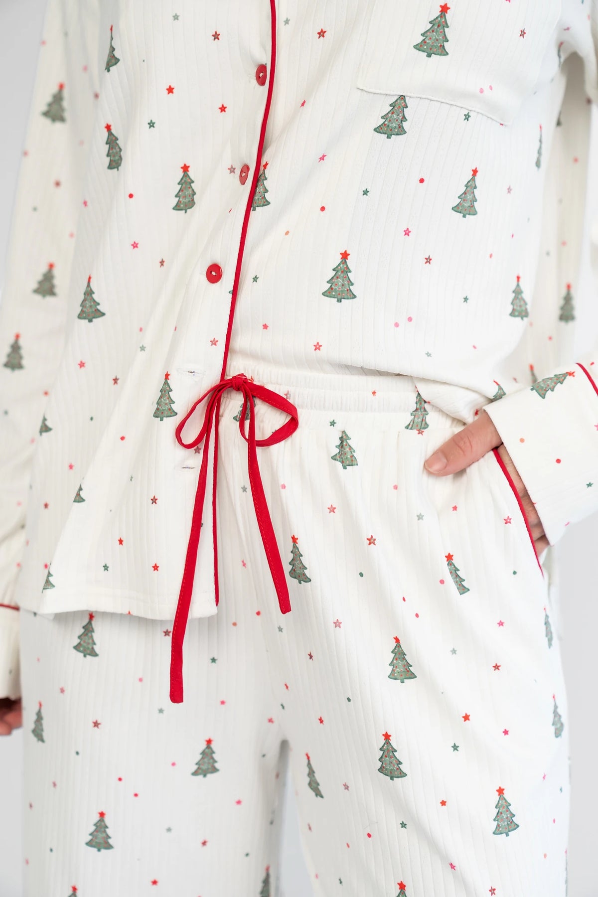 Holiday Cozy Rib Knit Pajamas in Ivory + Evergreen with an evergreen tree print, button-front top, and contrast red piping.