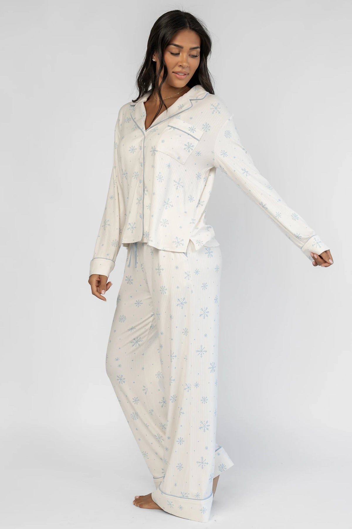 Holiday Cozy Rib Knit Pajamas in Ivory + Ice Blue with a snowflake print, button-front top, and contrast piping.