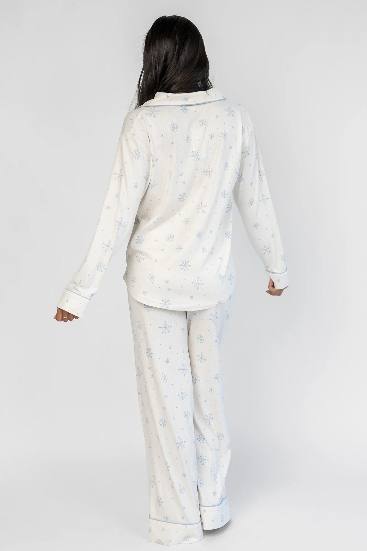 Holiday Cozy Rib Knit Pajamas in Ivory + Ice Blue with a snowflake print, button-front top, and contrast piping.
