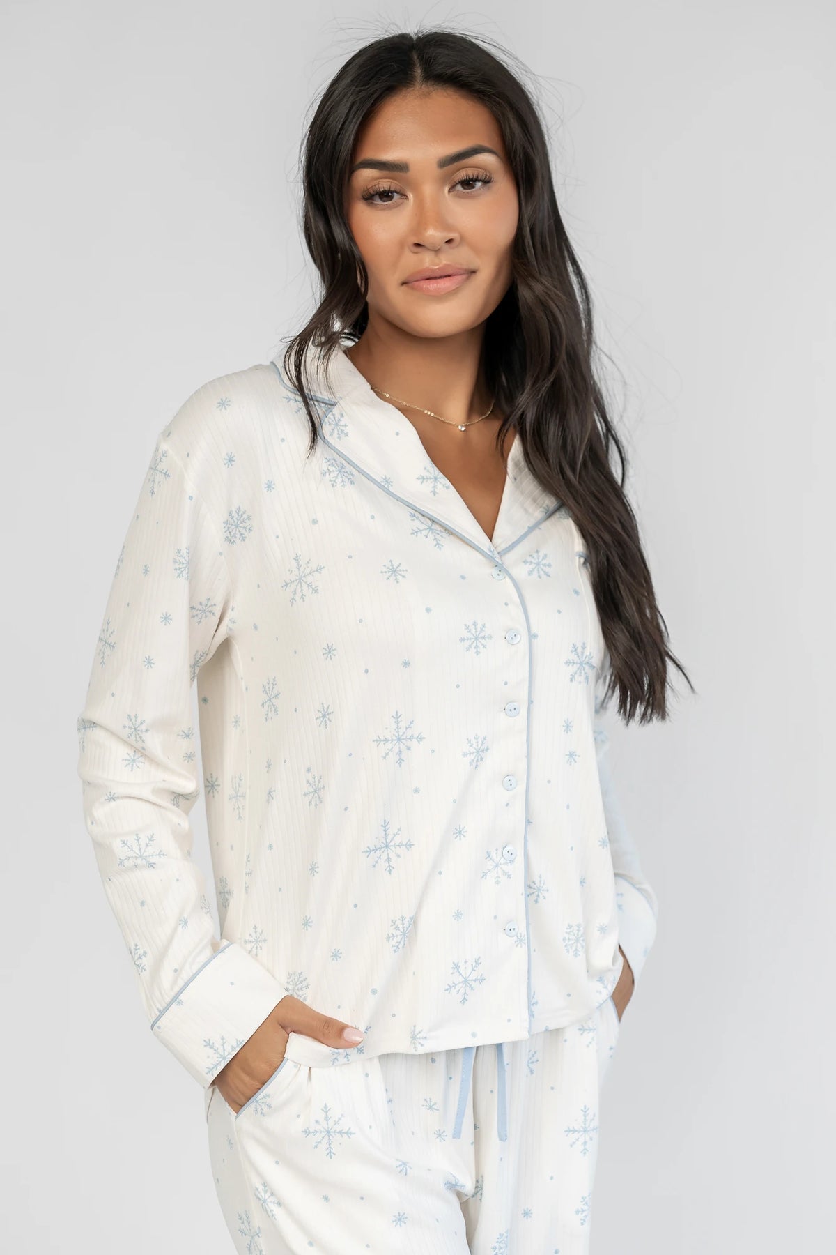 Holiday Cozy Rib Knit Pajamas in Ivory + Ice Blue with a snowflake print, button-front top, and contrast piping.