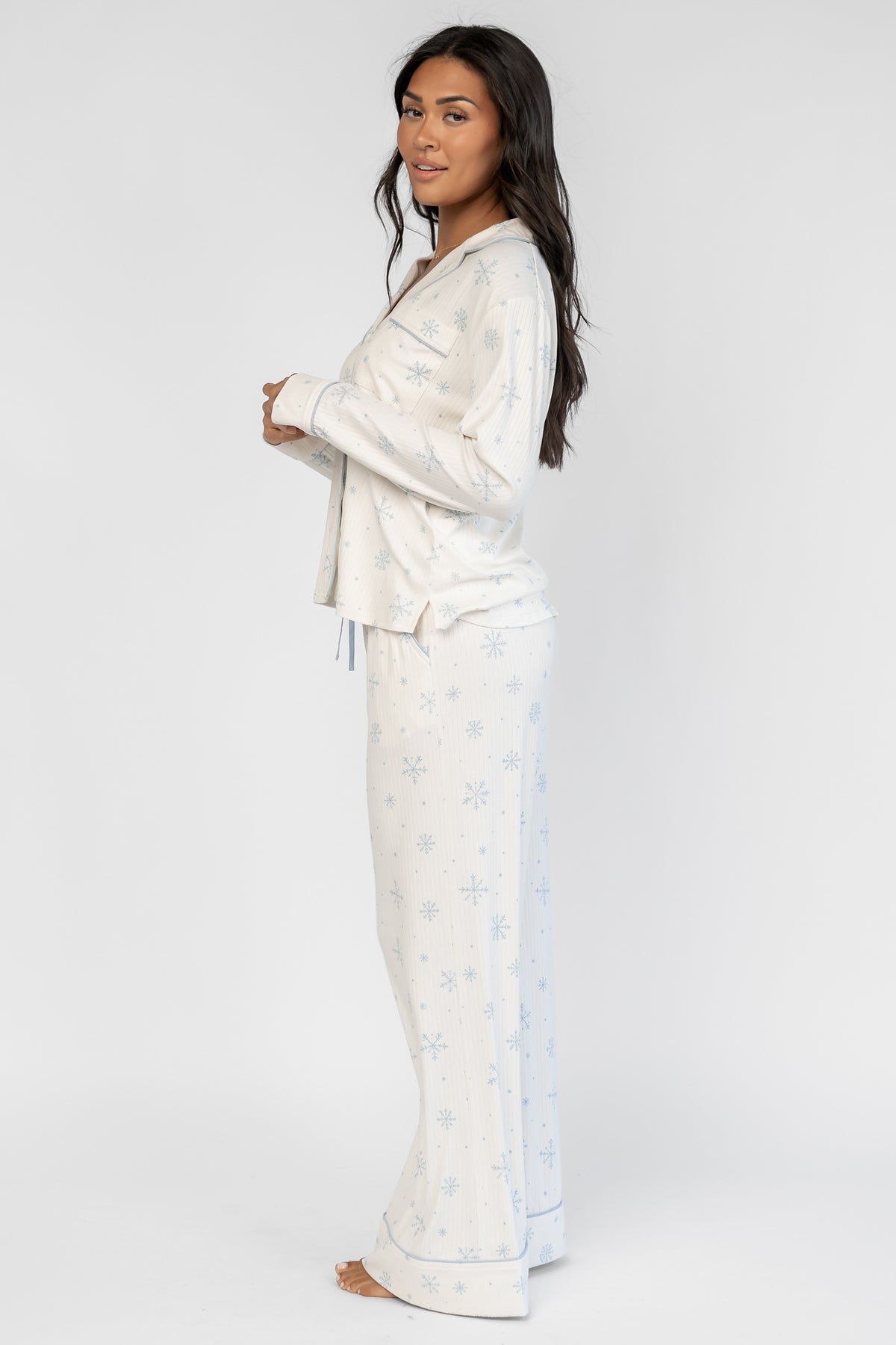 Holiday Cozy Rib Knit Pajamas in Ivory + Ice Blue with a snowflake print, button-front top, and contrast piping.