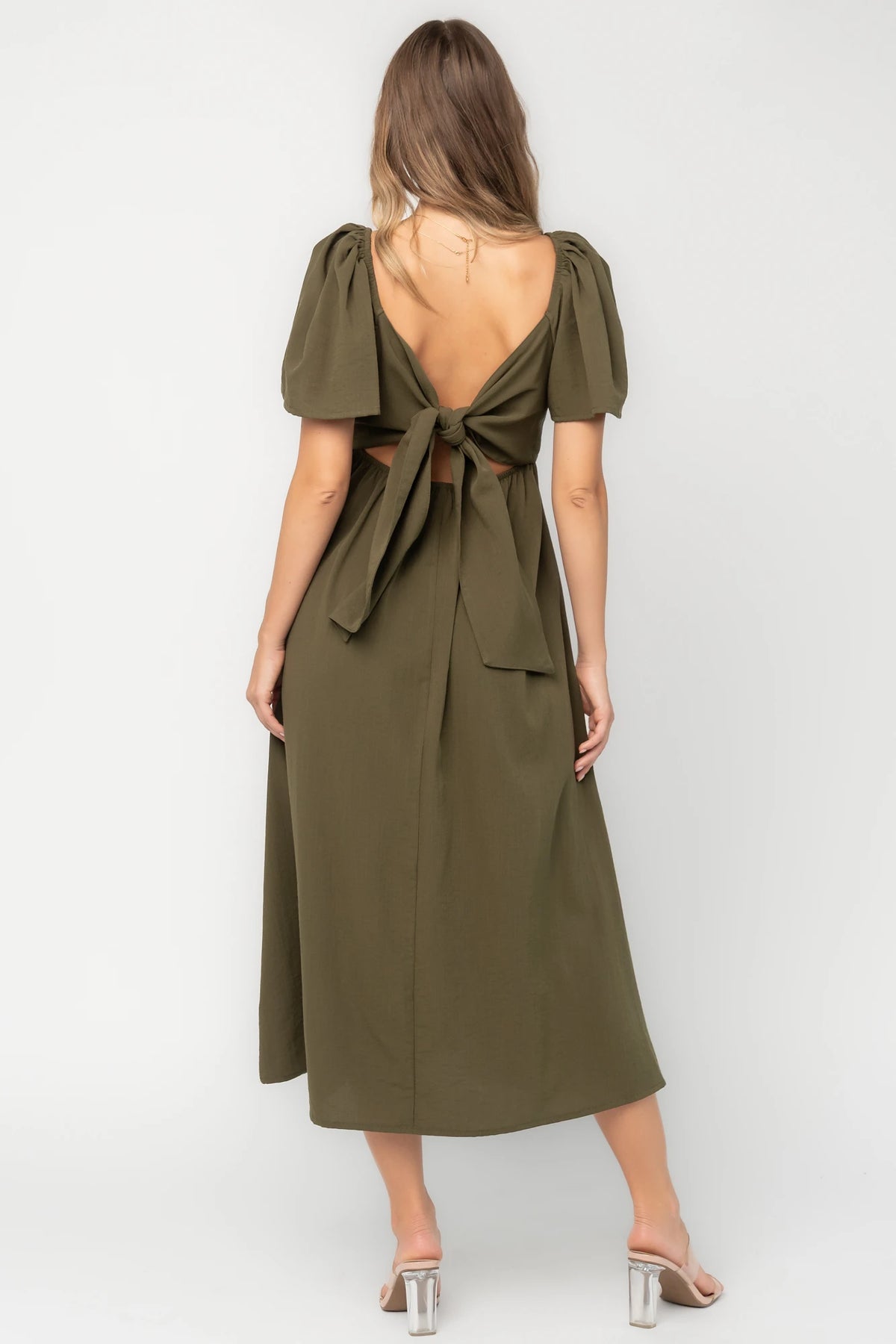 Indie Back Tie Dress in Olive with sweetheart neckline, butterfly sleeves, open tie-back, and side pockets.