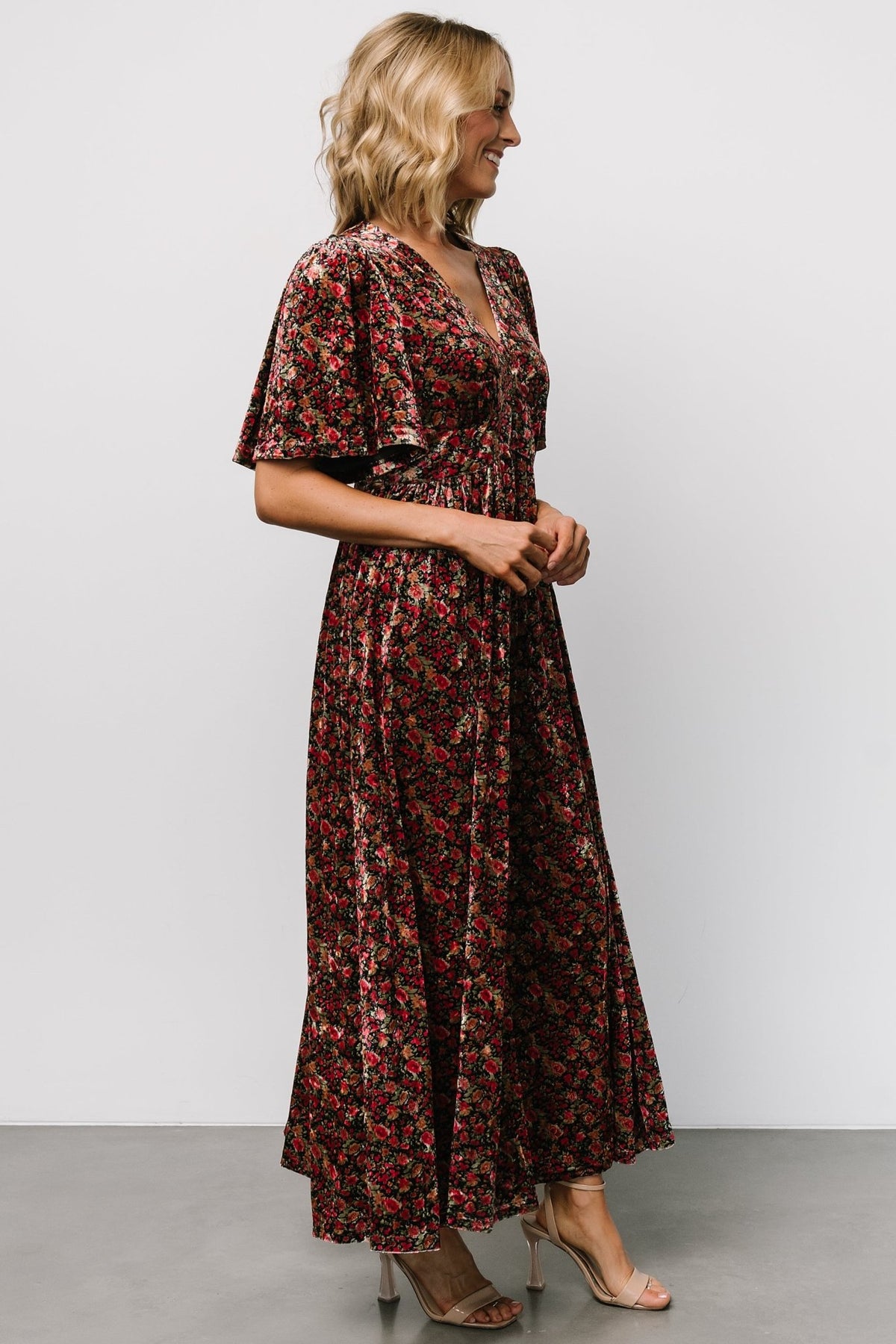 Close-up detail of the velvet fabric and metallic thread on the black multi floral Irina Maxi Dress, showing texture and print.