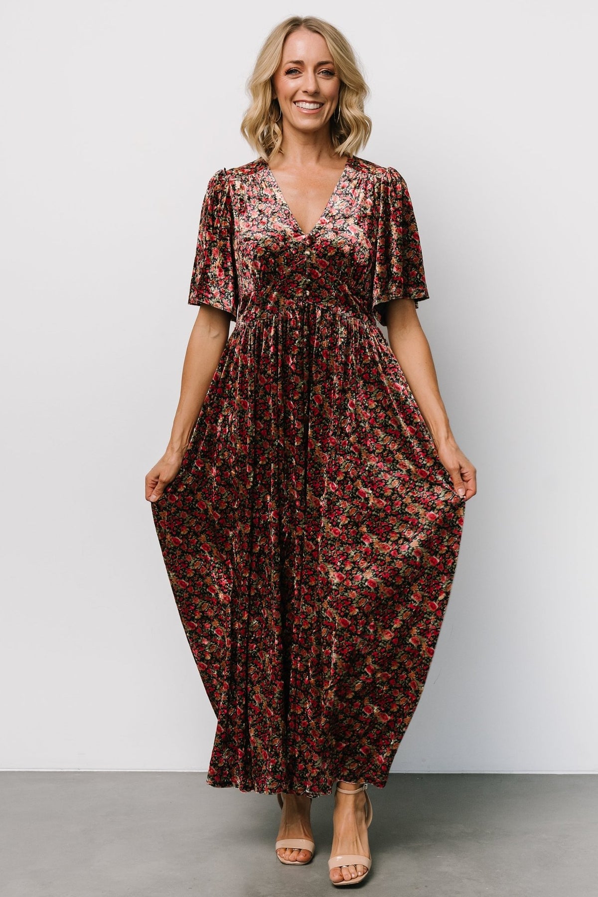 Front view of the Irina Velvet Maxi Dress in black multi floral showing the deep V-neck, faux buttons, and relaxed straight silhouette.