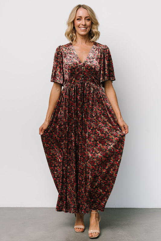 Front view of the Irina Velvet Maxi Dress in black multi floral showing the deep V-neck, faux buttons, and relaxed straight silhouette.