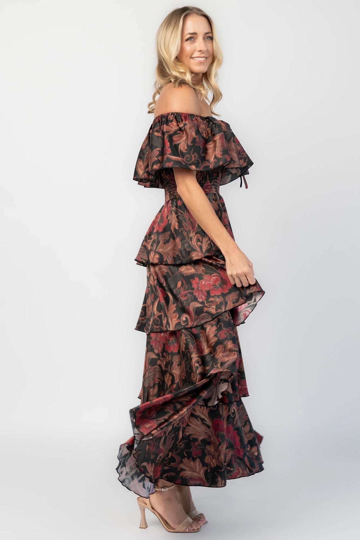 Isabelle Off Shoulder Maxi Dress in Black Multi Print with off-shoulder neckline, smocked waist, and tiered maxi skirt.
