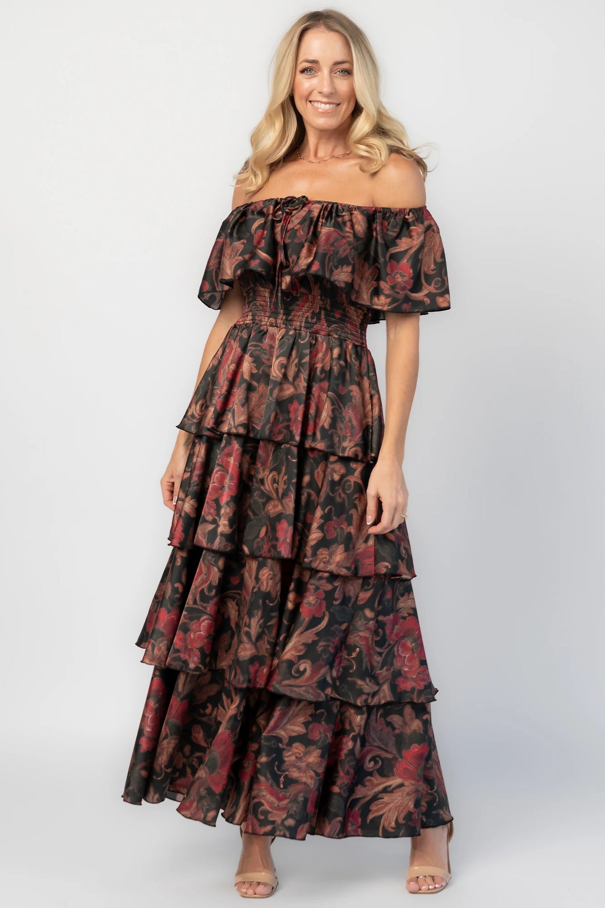 Isabelle Off Shoulder Maxi Dress in Black Multi Print with off-shoulder neckline, smocked waist, and tiered maxi skirt.