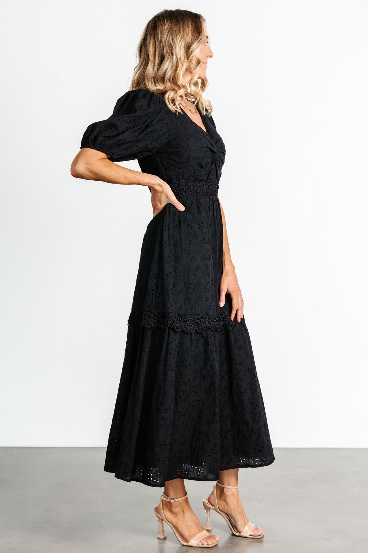 Detail shot of the gathered bust and V-neckline, illustrating the dress shaping and non-stretch woven fabric texture.