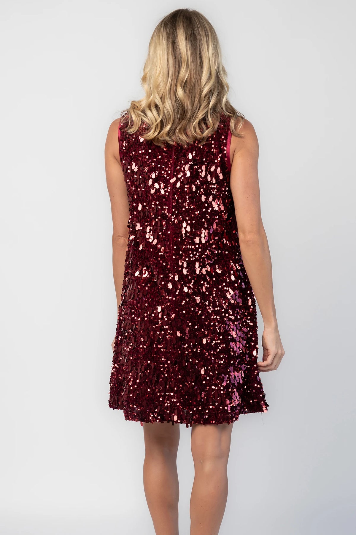 Jolene Sequin Short Dress in Wine with allover sequin detailing, a sleeveless silhouette, and a round neckline.