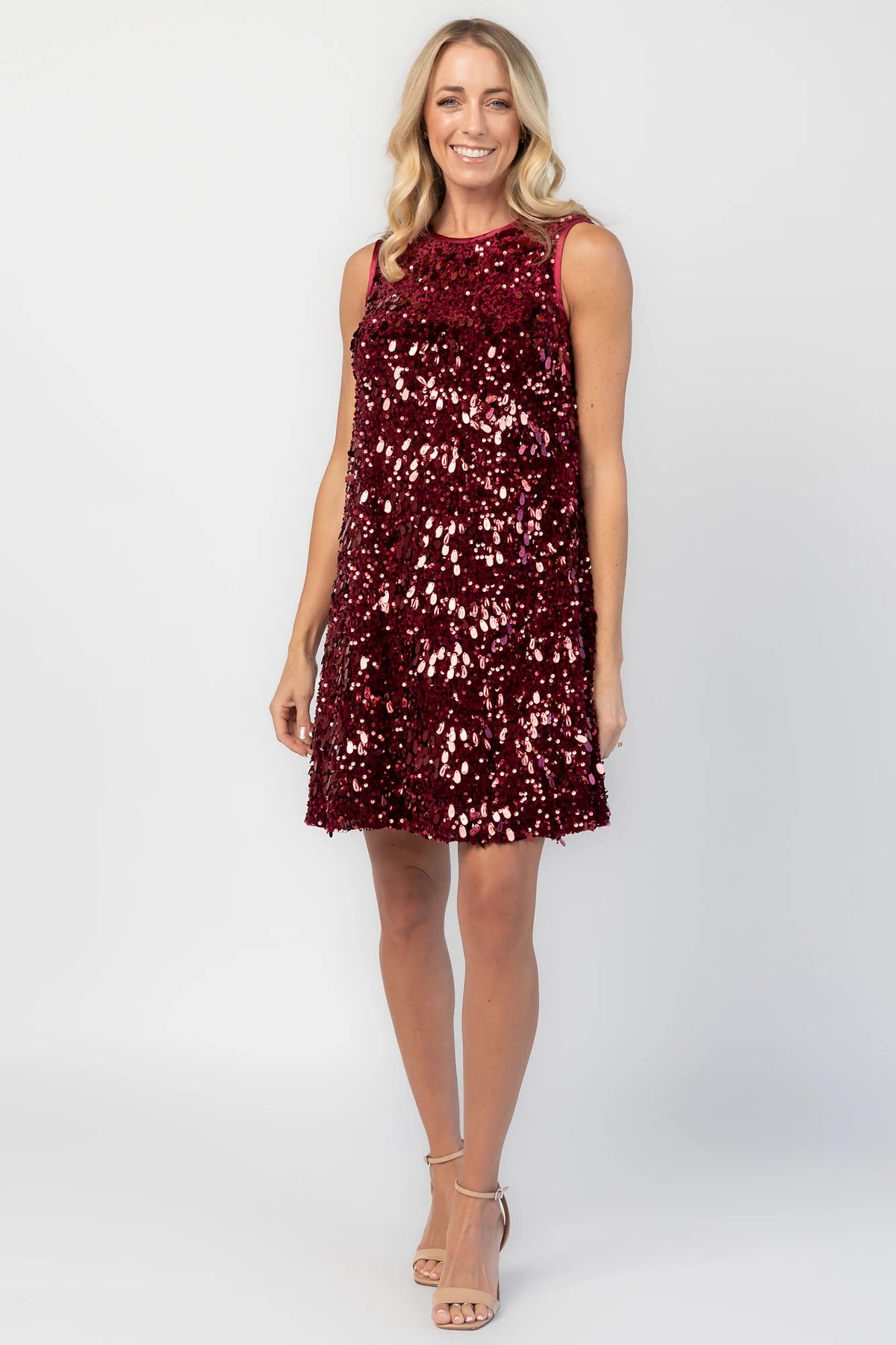 Jolene Sequin Short Dress in Wine with allover sequin detailing, a sleeveless silhouette, and a round neckline.