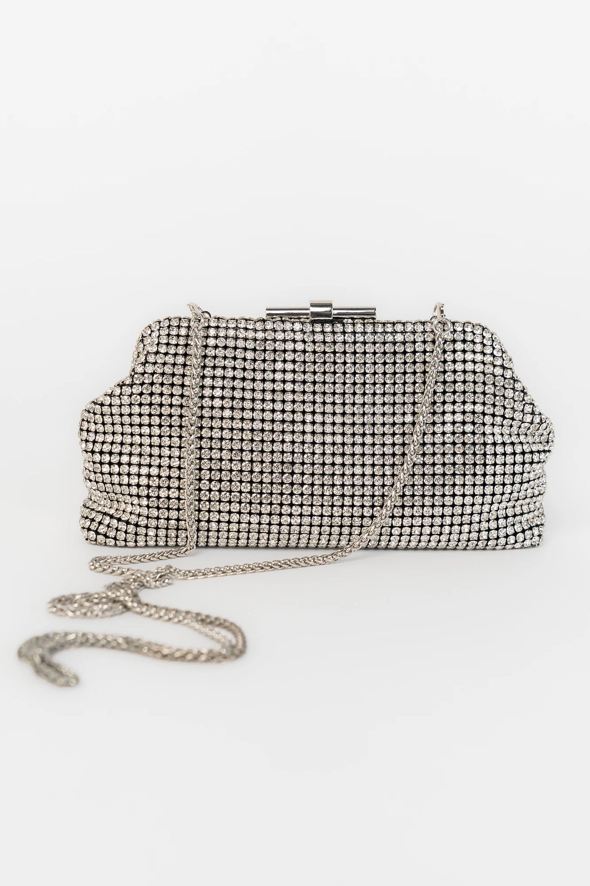 Julie Evening Clutch Bag with silver rhinestones, structured silhouette, clasp closure, and detachable chain strap.