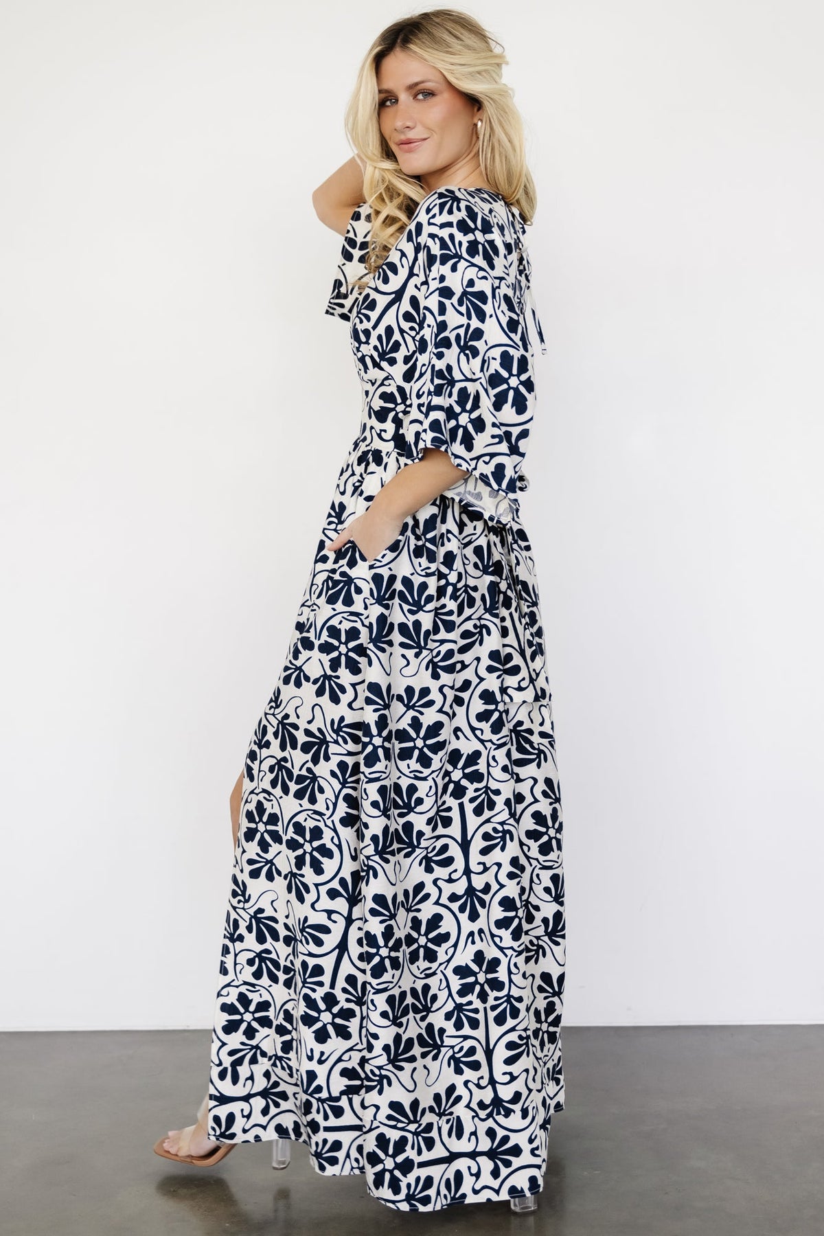 Full-length shot of the Juna Kimono Maxi Dress on model, highlighting hidden side pockets, tiered skirt, and overall silhouette.