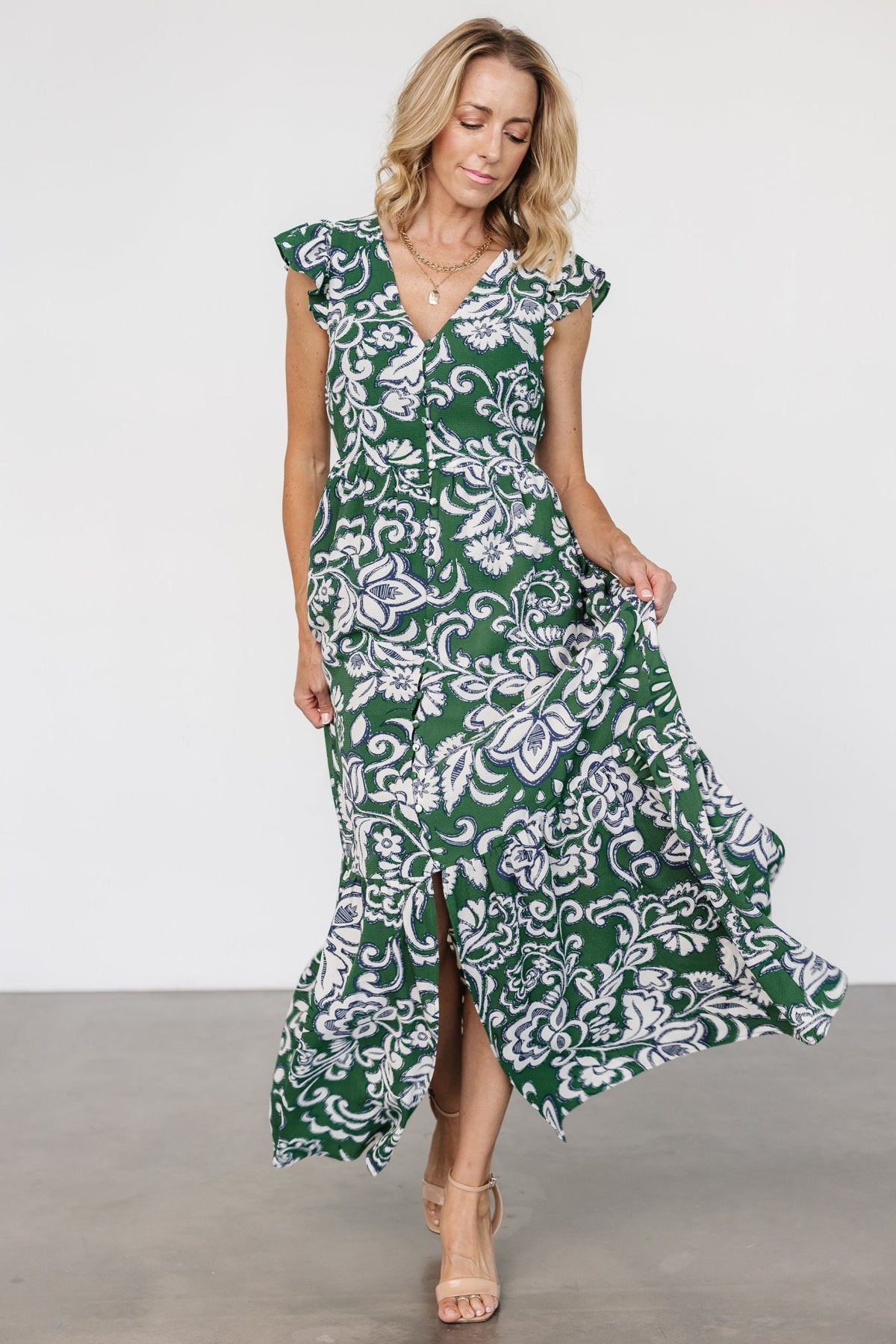 Detail image of fabric and print for Kaia Button Maxi Dress showing botanical pattern close-up and lightweight georgette texture.