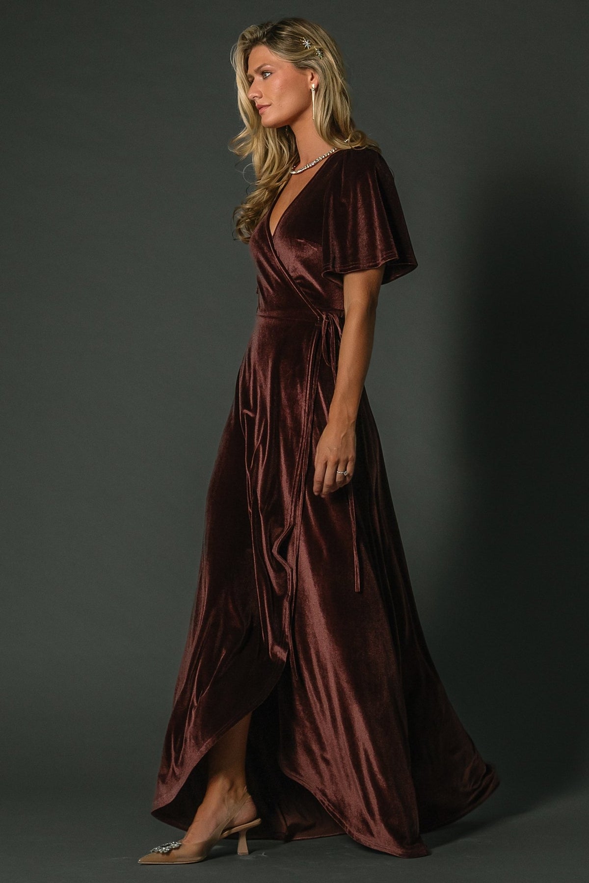 Close-up of the Katelyn velvet fabric texture and V-neckline, showing the slight stretch and the higher-coverage wrap construction.