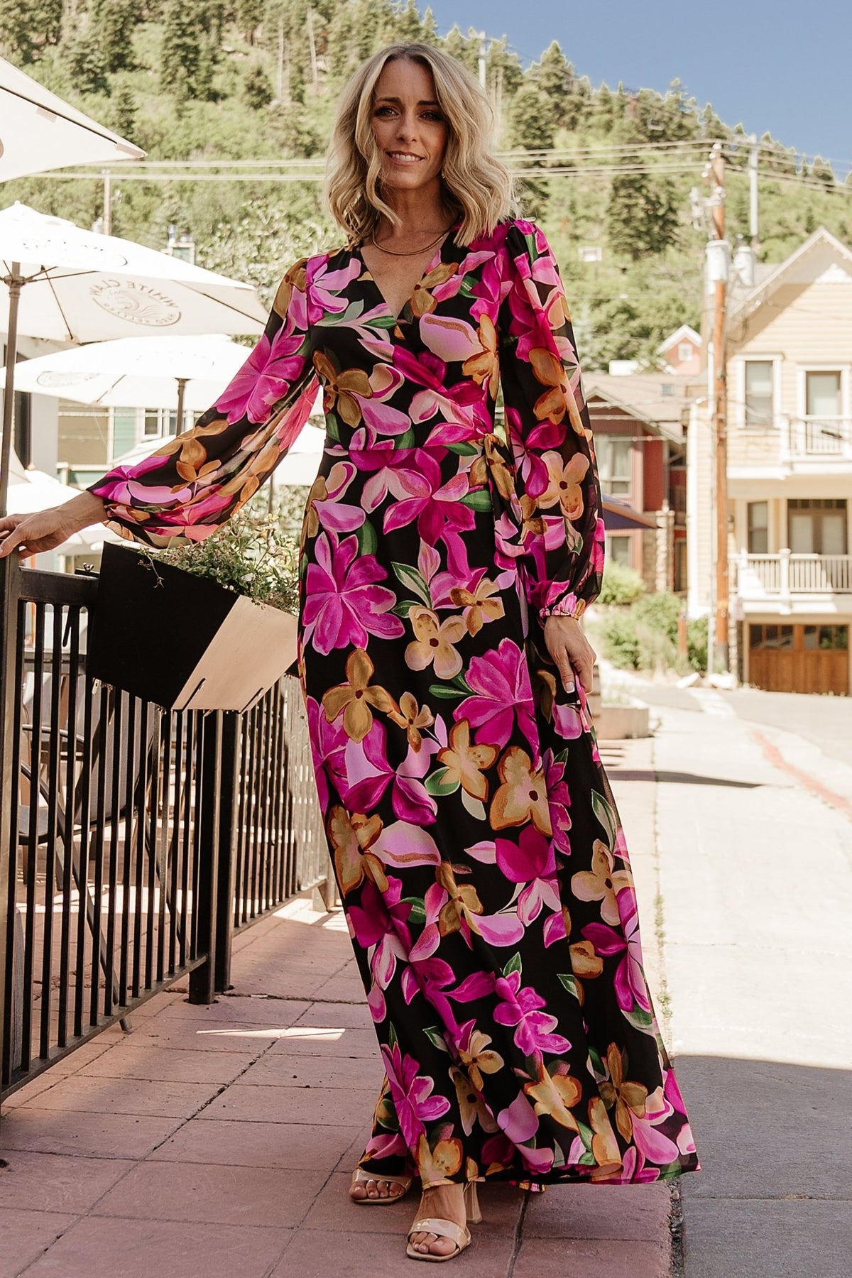 Back view of the Katinka Wrap Maxi Dress showing full-length skirt, gentle gathers, and the wrap tie at the waist from behind.