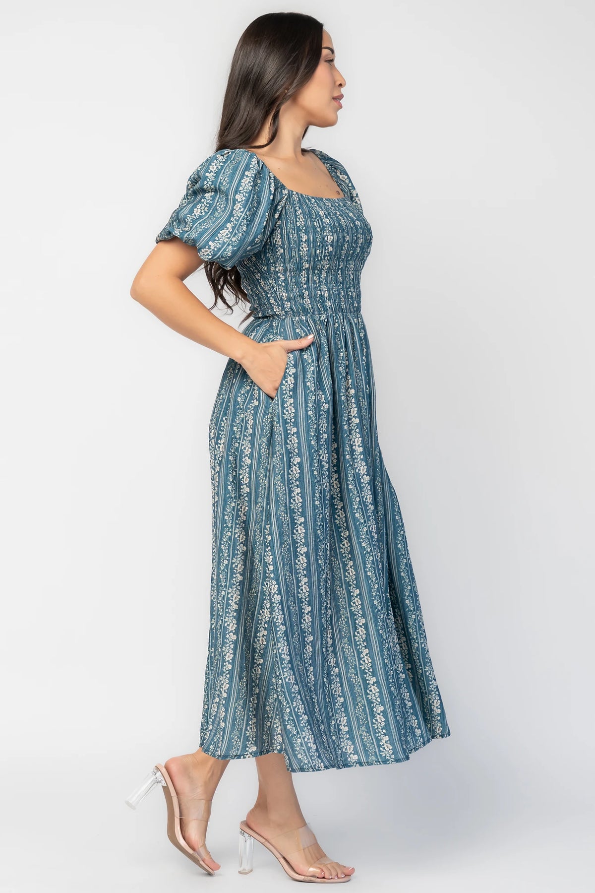 Keira Midi Dress in Blue Print with square neckline, smocked bodice, short puff sleeves, and midi skirt.