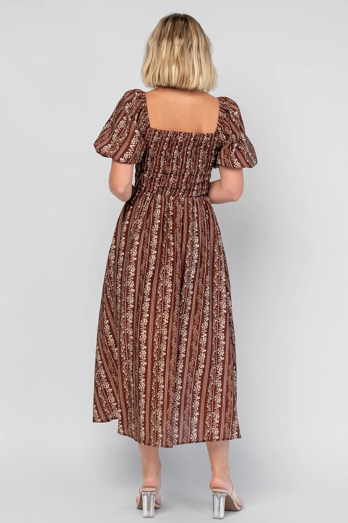 Keira Midi Dress in Mahogany Print with a square neckline, smocked bodice, and short puff sleeves.