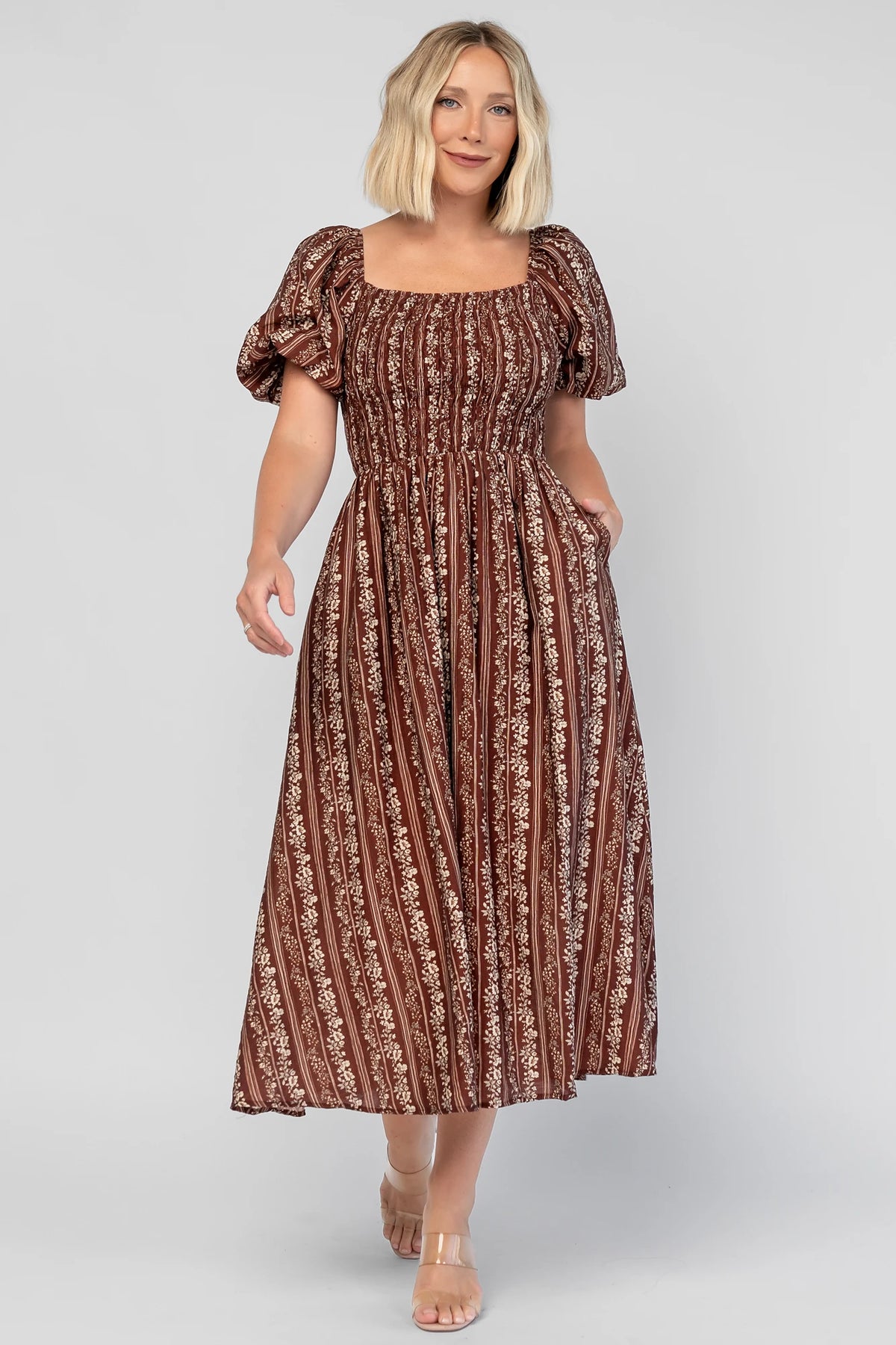 Keira Midi Dress in Mahogany Print with a square neckline, smocked bodice, and short puff sleeves.