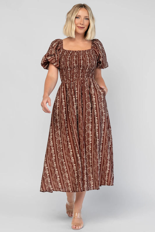 Keira Midi Dress in Mahogany Print with a square neckline, smocked bodice, and short puff sleeves.