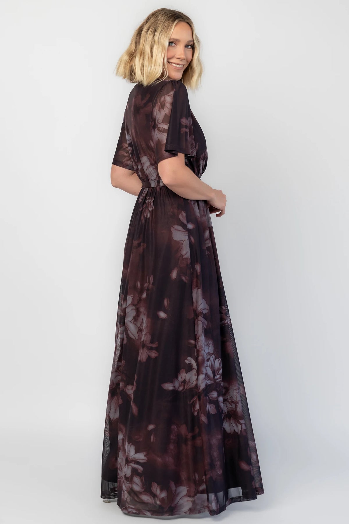Kristina Mesh Maxi Dress in Dark Clove Floral with crossover neckline, elastic waist, and side slit.