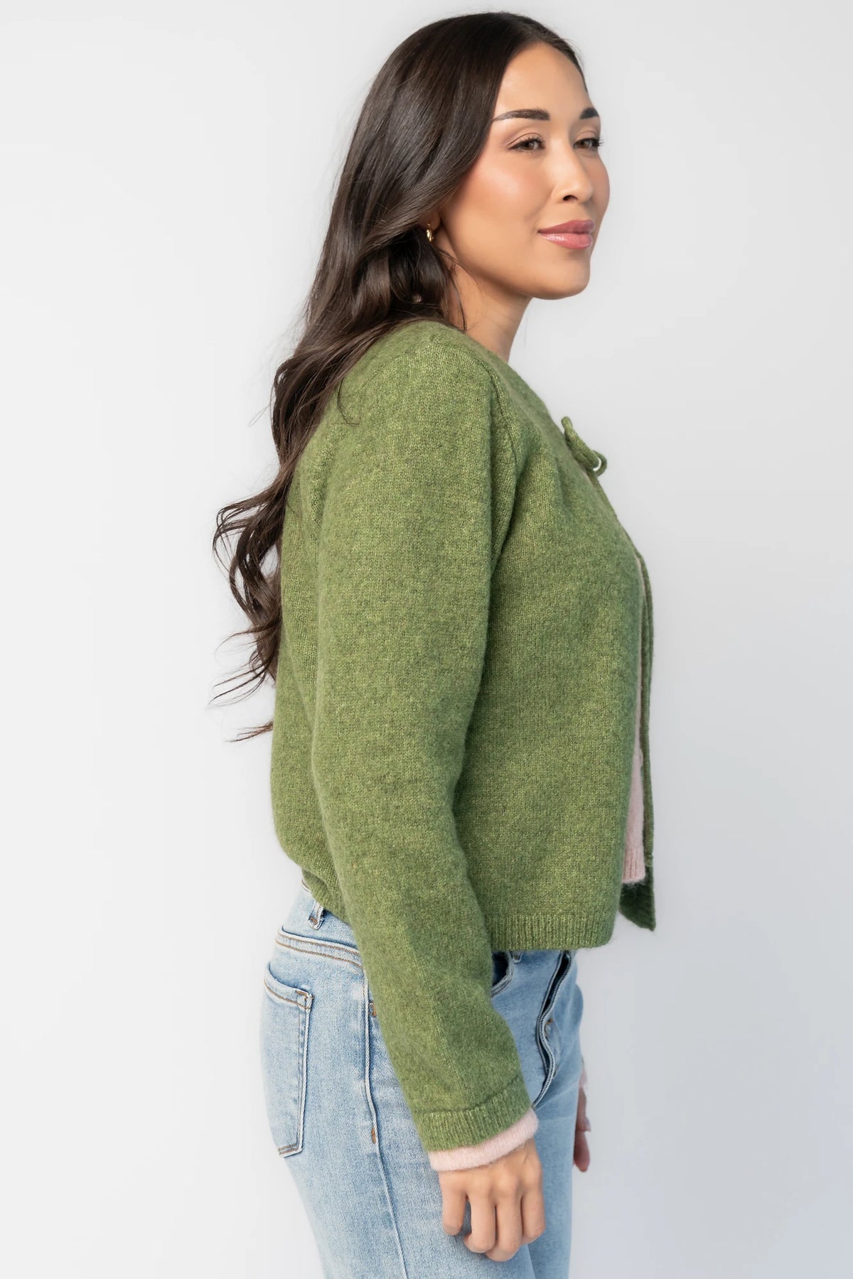 Landry Cardigan in Blush + Green with layered pink button-front panel, green front ties, crew neckline, and long sleeves.