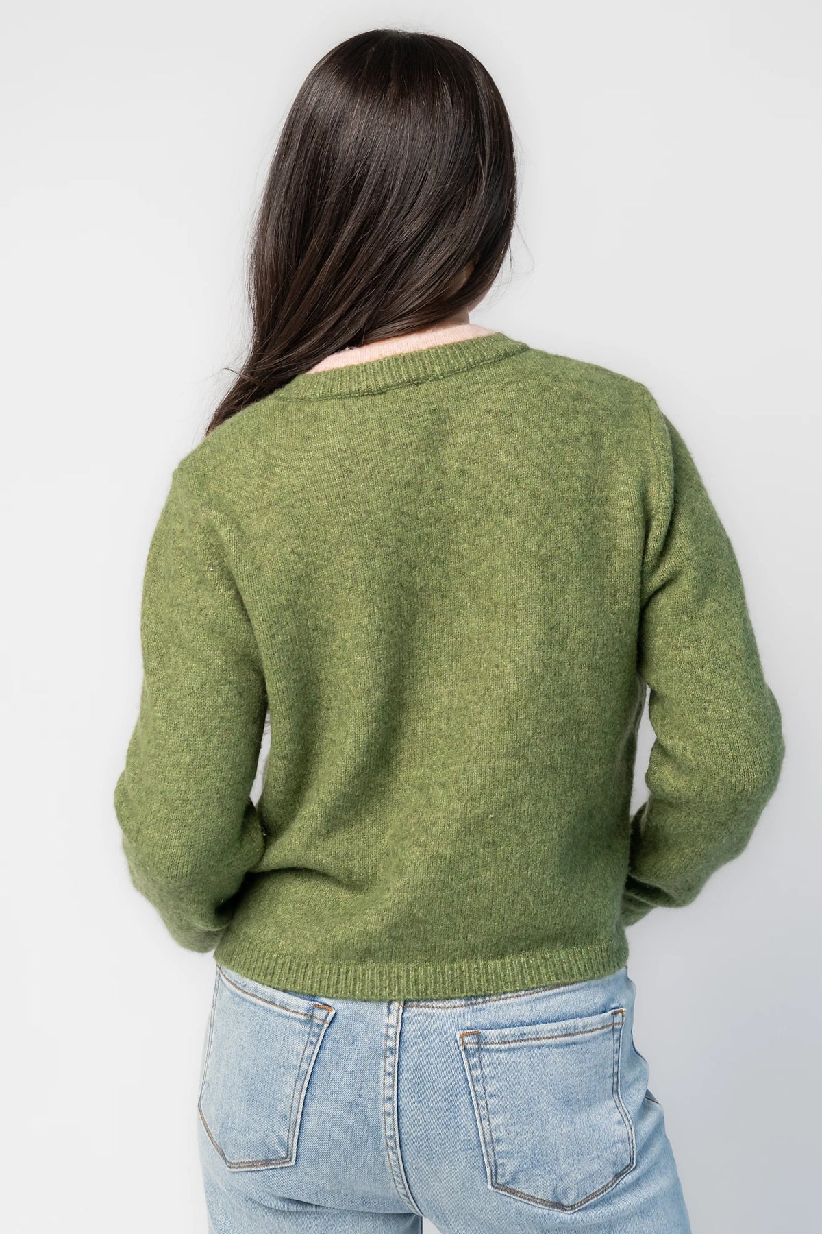 Landry Cardigan in Blush + Green with layered pink button-front panel, green front ties, crew neckline, and long sleeves.