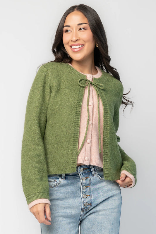 Landry Cardigan in Blush + Green with layered pink button-front panel, green front ties, crew neckline, and long sleeves.