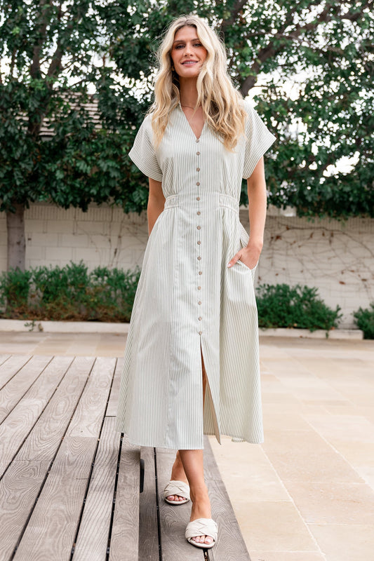 Front view of sage and off-white striped midi dress with collared V-neck, faux-button front, smocked back waist, and short cuffed sleeves.